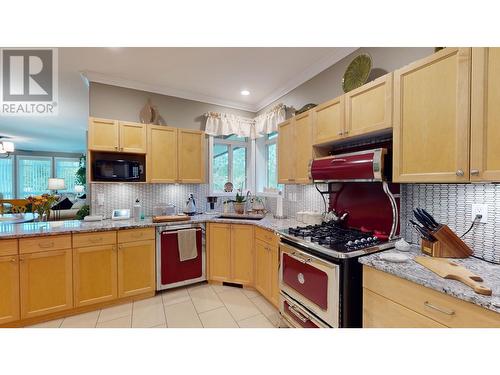 100 1702 Dyke Road, Quesnel, BC - Indoor Photo Showing Kitchen With Double Sink