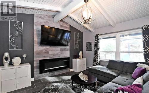 44 Brunswick Street, Oshawa, ON - Indoor Photo Showing Living Room With Fireplace