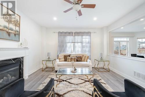 8 Decorso Drive, Brampton, ON - Indoor Photo Showing Living Room With Fireplace