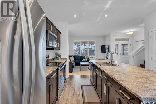 325 Secord Way, Saskatoon, SK - Indoor Photo Showing Kitchen With Double Sink With Upgraded Kitchen