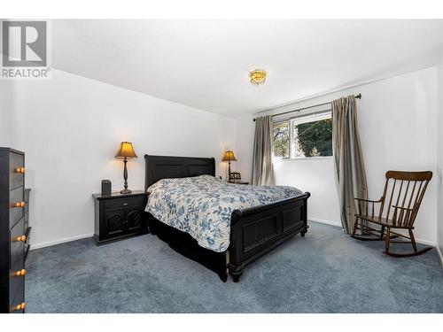 7701 Holtam Drive, Coldstream, BC - Indoor Photo Showing Bedroom