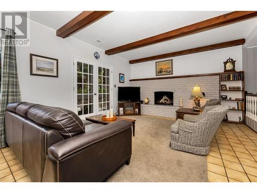 7701 Holtam Drive, Coldstream, BC - Indoor With Fireplace