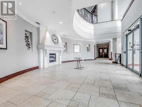 602 - 2565 Erin Centre Boulevard, Mississauga, ON - Indoor Photo Showing Other Room With Fireplace