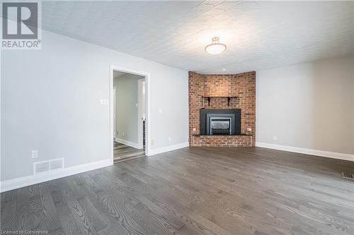 567 Rustic Drive, Waterloo, ON - Indoor Photo Showing Living Room With Fireplace