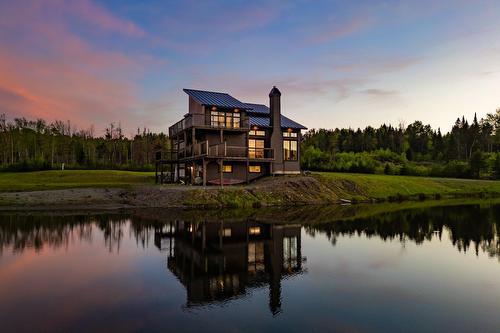 Façade - 80 Ch. Lebel, Saint-Herménégilde, QC - Outdoor With Body Of Water With View