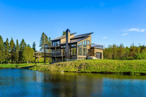 Façade - 80 Ch. Lebel, Saint-Herménégilde, QC - Outdoor With Body Of Water With View