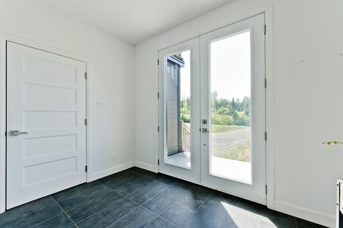 Hall d'entrée/Vestibule - 80 Ch. Lebel, Saint-Herménégilde, QC - Indoor Photo Showing Other Room