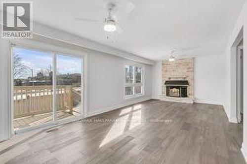 4281 Creeks End, Mississauga, ON - Indoor Photo Showing Living Room With Fireplace