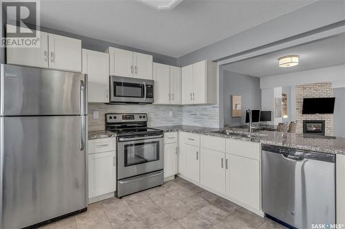 4758 Queen Street, Regina, SK - Indoor Photo Showing Kitchen With Stainless Steel Kitchen With Double Sink With Upgraded Kitchen