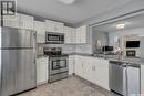 4758 Queen Street, Regina, SK  - Indoor Photo Showing Kitchen With Stainless Steel Kitchen With Double Sink With Upgraded Kitchen 