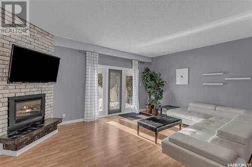 4758 Queen Street, Regina, SK - Indoor Photo Showing Living Room With Fireplace