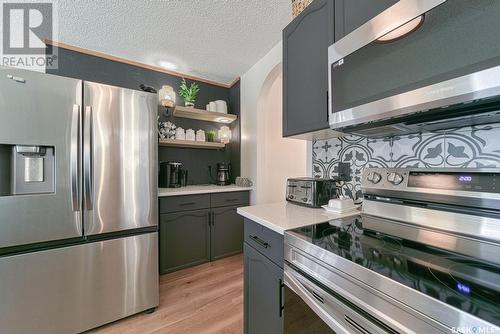 1707 Clive Bay E, Regina, SK - Indoor Photo Showing Kitchen With Stainless Steel Kitchen