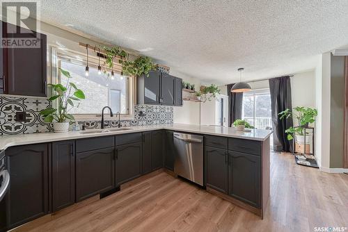 1707 Clive Bay E, Regina, SK - Indoor Photo Showing Kitchen With Double Sink