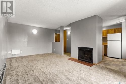 305 35 Alport Crescent, Regina, SK - Indoor With Fireplace