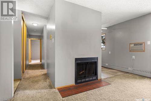 305 35 Alport Crescent, Regina, SK - Indoor With Fireplace