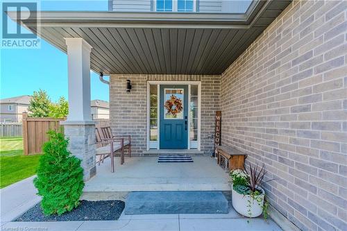 Property entrance featuring covered porch - 12 Hardcastle Place, Cambridge, ON - Outdoor With Deck Patio Veranda With Exterior