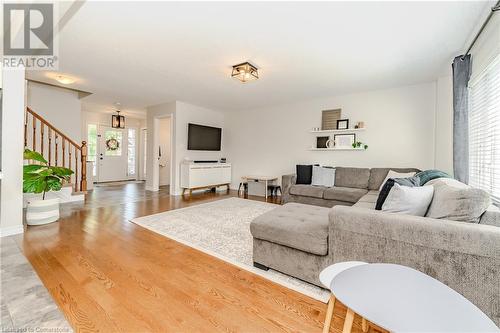 Living room featuring hardwood / wood-style flooring and a wealth of natural light - 12 Hardcastle Place, Cambridge, ON - Indoor Photo Showing Living Room