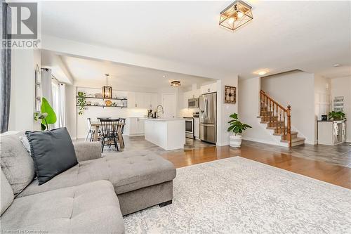 Living room featuring sink and light hardwood / wood-style flooring - 12 Hardcastle Place, Cambridge, ON - Indoor Photo Showing Living Room