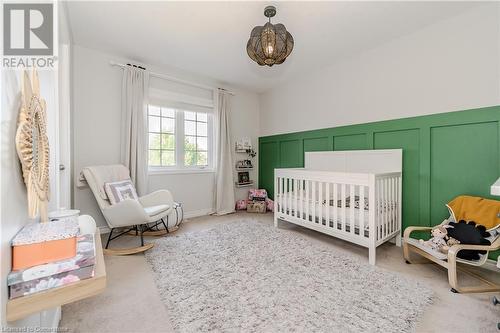 Bedroom featuring carpet floors and a nursery area - 12 Hardcastle Place, Cambridge, ON - Indoor Photo Showing Bedroom