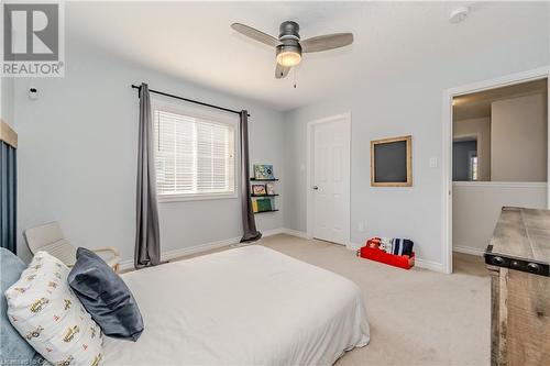 Bedroom featuring ceiling fan and light colored carpet - 12 Hardcastle Place, Cambridge, ON - Indoor Photo Showing Bedroom