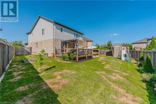 Back of house featuring a storage shed, a pergola, a lawn, and a deck - 12 Hardcastle Place, Cambridge, ON - Outdoor With Deck Patio Veranda With Backyard With Exterior