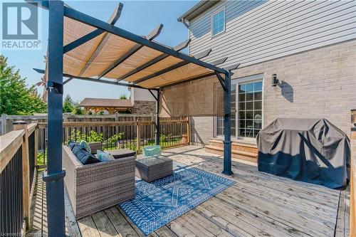 Wooden terrace with a pergola and an outdoor hangout area - 12 Hardcastle Place, Cambridge, ON - Outdoor With Deck Patio Veranda With Exterior