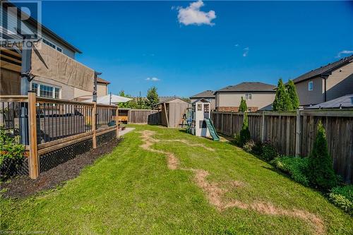 View of yard featuring a playground and a storage unit - 12 Hardcastle Place, Cambridge, ON - Outdoor With Deck Patio Veranda