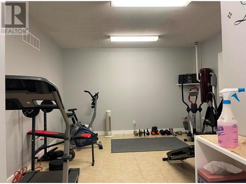 Co-owners Gym in the clubhouse - 8000 Highland Road Unit# 42, Vernon, BC - Indoor Photo Showing Gym Room