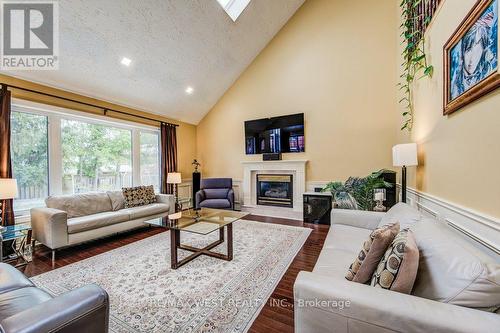 610 Stonebury Crescent, Waterloo, ON - Indoor Photo Showing Living Room With Fireplace