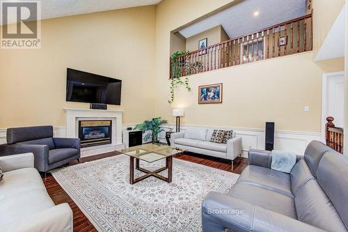 610 Stonebury Crescent, Waterloo, ON - Indoor Photo Showing Living Room With Fireplace