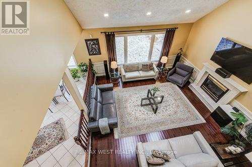 610 Stonebury Crescent, Waterloo, ON - Indoor Photo Showing Living Room With Fireplace