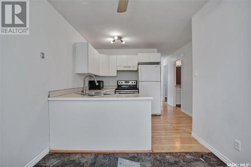 250 Lochrie Crescent, Saskatoon, SK - Indoor Photo Showing Kitchen With Double Sink