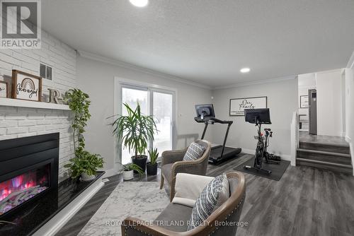 71 St Clair Court, London, ON - Indoor Photo Showing Gym Room With Fireplace