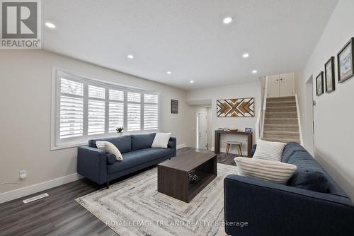 71 St Clair Court, London, ON - Indoor Photo Showing Living Room With Fireplace