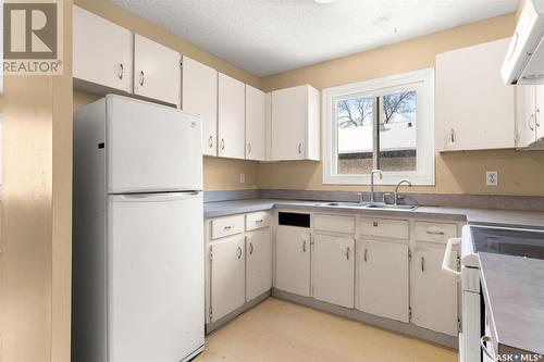 206 Thomson Avenue, Regina, SK - Indoor Photo Showing Kitchen With Double Sink