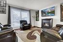 1210 Butterfield Crescent, Regina, SK  - Indoor Photo Showing Living Room With Fireplace 