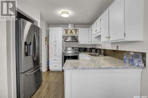 1210 Butterfield Crescent, Regina, SK - Indoor Photo Showing Kitchen With Double Sink