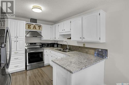 1210 Butterfield Crescent, Regina, SK - Indoor Photo Showing Kitchen With Double Sink