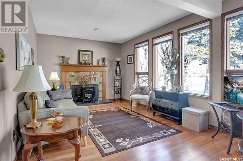 407 Holland Avenue, Regina, SK - Indoor Photo Showing Living Room With Fireplace