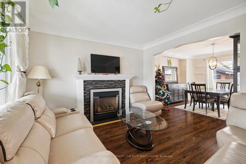 167 Balsam Avenue N, Hamilton, ON - Indoor Photo Showing Living Room With Fireplace