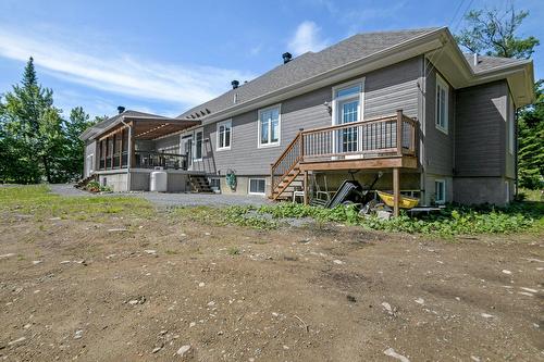 Back facade - 111 Rue Du Joli-Bois, Sainte-Marguerite-Du-Lac-Masson, QC - Outdoor With Deck Patio Veranda
