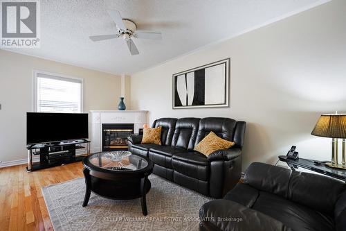 728 Spanish Moss Trail, Mississauga, ON - Indoor Photo Showing Living Room With Fireplace