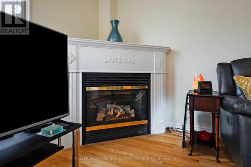 728 Spanish Moss Trail, Mississauga, ON - Indoor Photo Showing Living Room With Fireplace