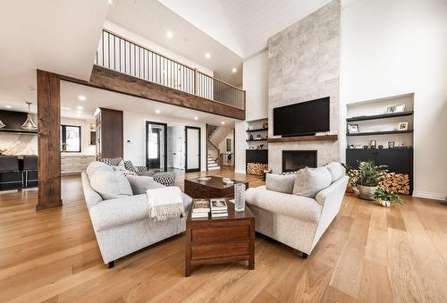 Living room - 77 Rue Dwight, Morin-Heights, QC - Indoor Photo Showing Living Room With Fireplace