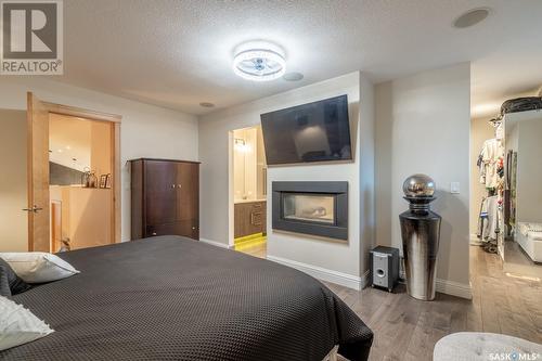 2670 Sandringham Crescent, Regina, SK - Indoor Photo Showing Bedroom With Fireplace