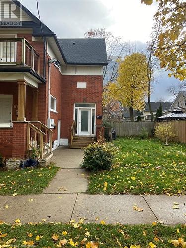 Entrance to property with a lawn - 67 Louisa Street, Kitchener, ON - Outdoor