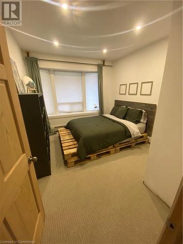 Bedroom with carpet floors - 67 Louisa Street, Kitchener, ON - Indoor Photo Showing Bedroom