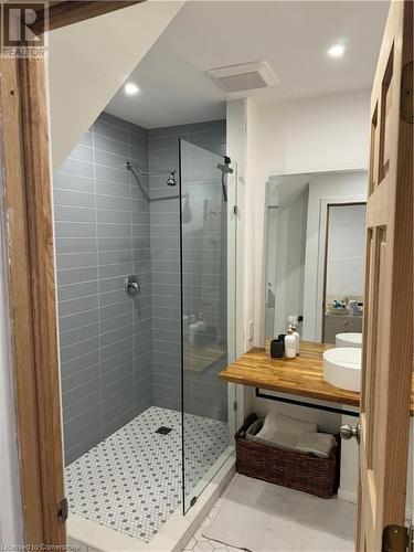 Bathroom featuring vanity and a shower with door - 67 Louisa Street, Kitchener, ON - Indoor Photo Showing Bathroom