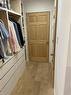 Walk in closet with light wood-type flooring - 67 Louisa Street, Kitchener, ON  - Indoor With Storage 