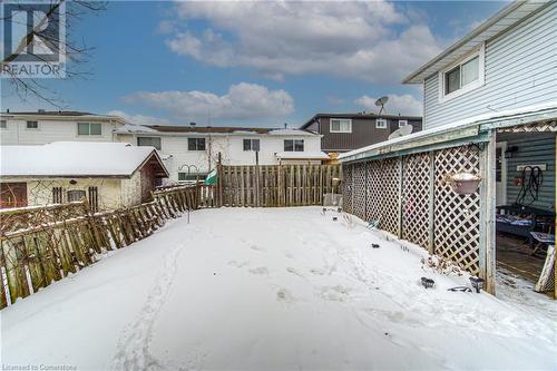 View of snowy yard - 539 Pinetree Crescent, Cambridge, ON - Outdoor With Deck Patio Veranda With Exterior